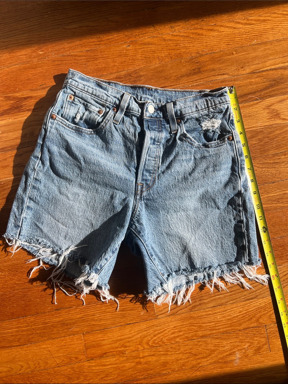 Levi's Light Blue Distressed Frayed Hem Denim Shorts